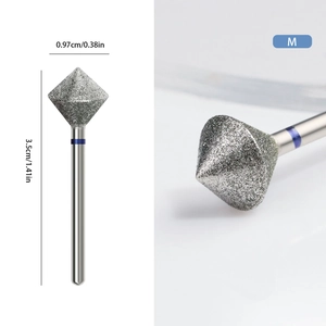 Macro view of M-grade diamond nail drill bit with 0.97cm width and 3.5cm length measurements