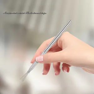Macro detail of anti-slip stainless steel handle and fine brush tip nail art tool