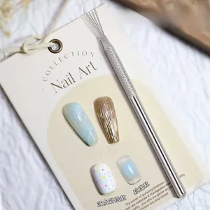 Macro view of multi-function 7-needle nail art pen with textured handle and fine steel tips