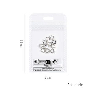 Star pendant hollow alloy nail charms set with silver heart rhinestones on white card