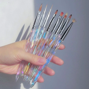 Close-up of 8pcs nail art brushes with iridescent laser acrylic handles and assorted tips