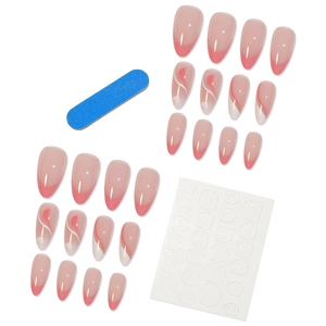 Almond press-on nail kit with pink French tips and white heart swirls including tools