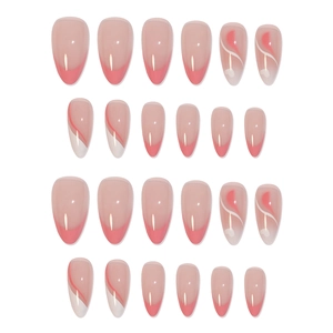 Pink and white almond press-on nails set with French tips and heart patterns