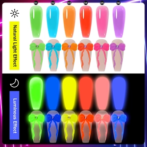 Luminous press-on nails with 3D bows showing natural light and glowing effects