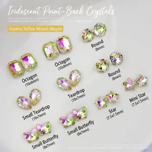 Vista macro di cristalli K9 giallo aurora per nail art in varie forme e dimensioni