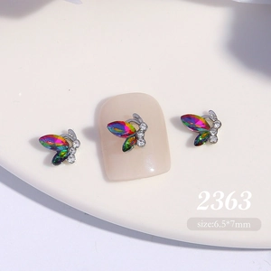 Macro view of 6.5x7mm 3D crystal butterfly nail art charm with silver metal base