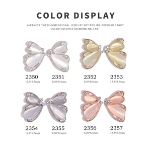 Bijoux d'ongles nœuds avec pierre œil de chat et strass en huit couleurs variées