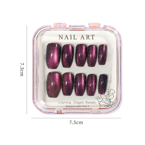 Detail of dark purple cat-eye nail patches with glitter finish in a 7.5cm square box