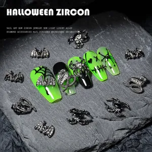 Gothic silver alloy nail charms with zircon on neon green nails for Halloween decor