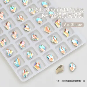 Detailed view of Aurora K9 glass axe-shaped nail art rhinestones in 10x6.5mm size