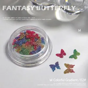 Macro detail of holographic gradient butterfly nail art flakes in 02# model box