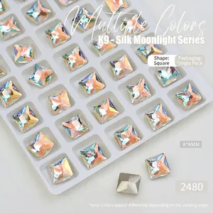 Macro detail of K9 square 8x8mm Aurora crystal nail art decoration from Silk Moonlight series