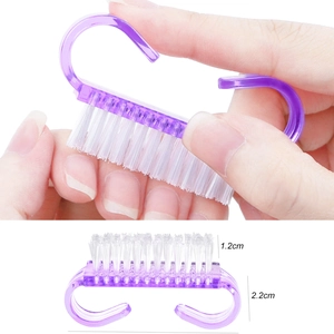 Purple transparent nail cleaning brush with ergonomic handle and firm white bristles