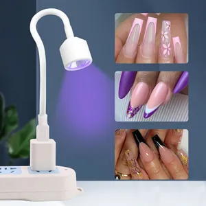 Detail of USB UV nail lamp with flexible gooseneck and curing results on manicure art