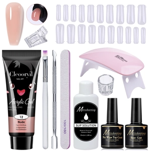 Detailed 11-piece nail extension kit including UV lamp and various gel accessories