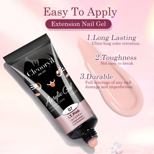 Detailed view of pink acrylic nail extension gel tube with smooth gel texture sample