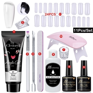 Detailed 11-piece nail extension kit including UV lamp, gel, tips and professional tools