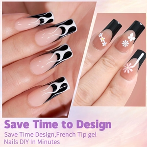 Detailed view of French-style black and white flame nails with 3D floral and butterfly accents