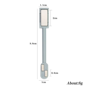 Detail view of a double-ended cat eye nail magnet tool with lightning bolt logo and dimensions
