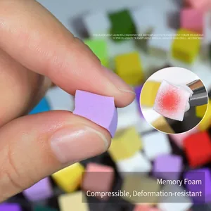 Macro shot of colorful mini nail sponges showing high elasticity and soft texture
