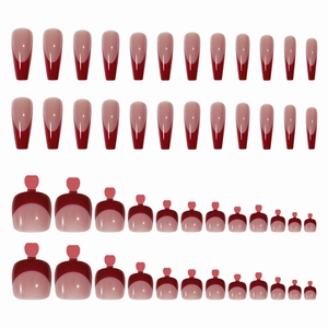 Classic French red and nude press-on nail set for fingers and toes on white background