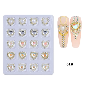 Detail of heart-shaped nail charms with crystals and pearls on gold base 20pcs pack
