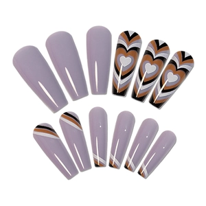 Brown wave pattern and heart design press-on nails in long trapezoid shape