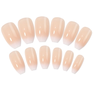 Pink and white ombre press-on nails with a high-gloss finish in a square-oval shape