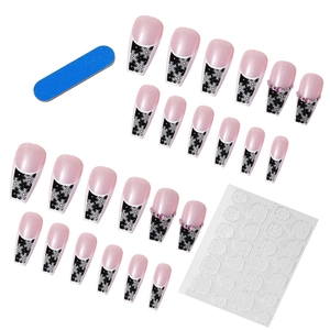 Set unghie finte ballerina con fiocchi di neve punte French nere e strass