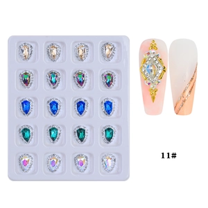 Detail view of water drop nail art rhinestones in diverse colors with application styles
