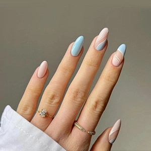 French blue wavy almond press-on nails with blue and pink contrast design for women