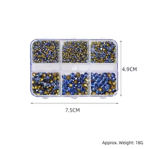 Nail art crystal set in 6-grid box with assorted blue and gold pointed back rhinestones