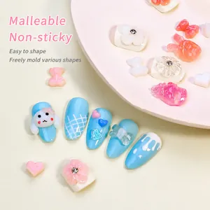 3D-Skulpturen-Nagelgel-Set mit Makronen-Bär und Blumenmotiven auf blauen Nägeln