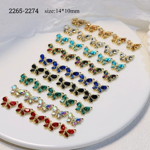 Colorful butterfly nail art charms made of crystal and alloy in various vibrant colors