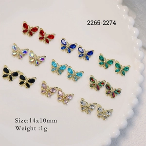Set of crystal butterfly nail charms in 9 colors with gold alloy frames 14x10mm