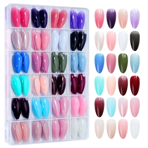 Detail of 24-color press-on nail kit featuring matte and glossy long stiletto fake nails