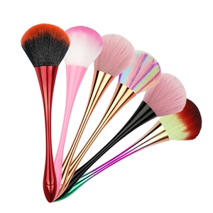 Set of six colorful fan-shaped nail dust brushes with metallic handles for powder application