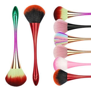 Detailed close-up of colorful makeup brushes with fiber bristles and metallic handles