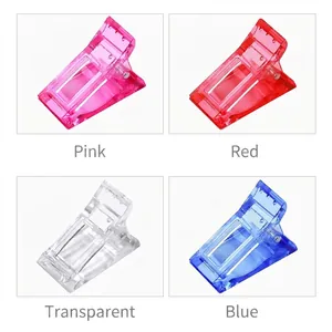 Strong clear plastic clips in pink, red, blue, and transparent colors with metal springs