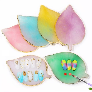 Leaf shaped resin nail art palettes in macaron colors with gold foil edges