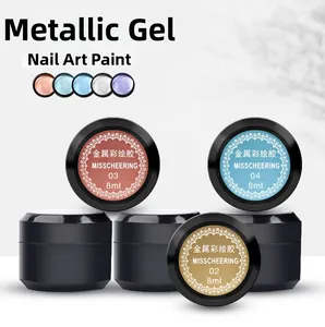 Detailed view of 8ml metallic nail painting gel jars in gold and copper colors