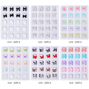 Set of 3D aurora butterfly and candy-colored resin nail art charms in 20-compartment box