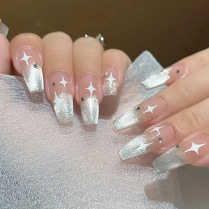 Sparkling silver cat eye coffin fake nails with hand-painted stars and crystals