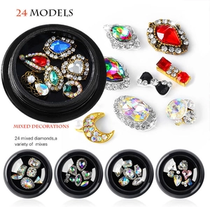 Detailed set of 24 alloy nail art charms with colorful rhinestones in storage cases