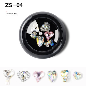 Macro shot of assorted heart-shaped alloy nail charms with rhinestones and pearls ZS-04