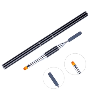 Detailed view of dual-ended nail tool with flat orange brush and metal spatula scraper
