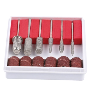 Detailed set of six diamond nail drill bits and sanding bands in a red sponge base