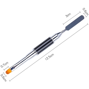 Dual-ended nail tool showing macro details of spatula and fiber brush head with dimensions