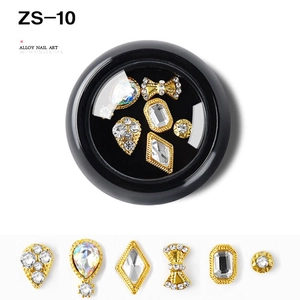 Detailed macro view of assorted ZS-10 alloy nail art charms with sparkling rhinestones
