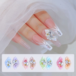 Detail of 3D resin flower nail charms with pearls and rhinestones in six colors